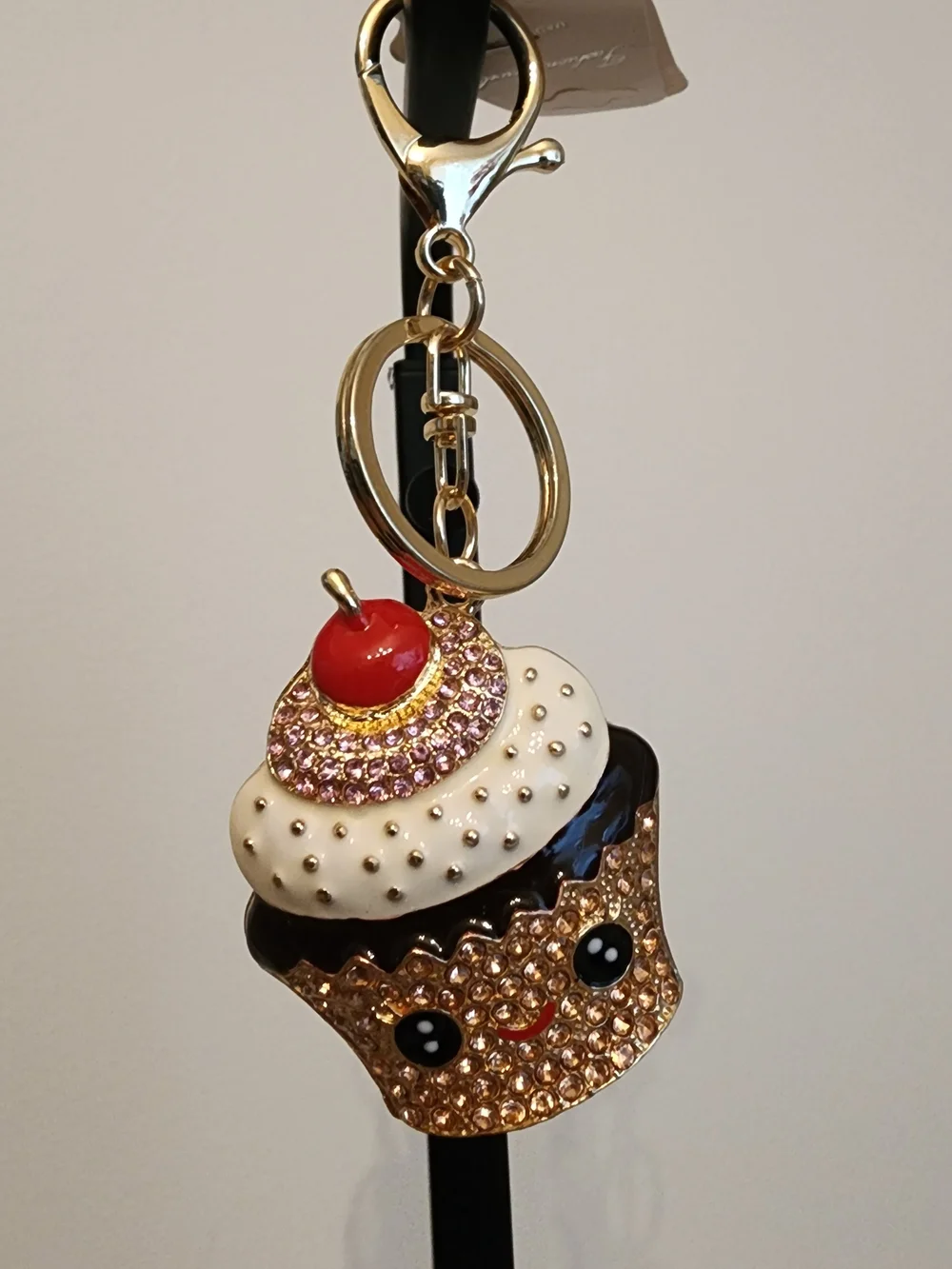 Gold-tone Cupcake Keychain with Pink and White Accents